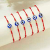 Pulsera roja ajustable con ojo turco