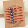 Pulsera roja ajustable con ojo turco