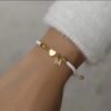 Pulsera negra o blanca para mujer con corazon e iniciales